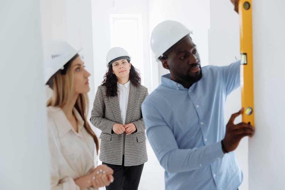 Experienced home insulation and siding contractor reviewing architectural plans